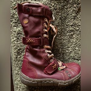 Red zip up winter/fall boots.